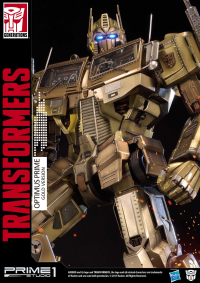 Premium Masterline Transformers: Generation 1 Optimus Prime Gold Version 5